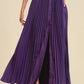 Pleated Skirt With Buttons And Pockets